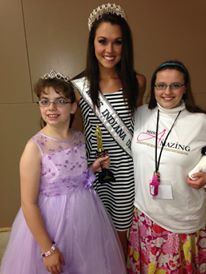 Stacy (left) and her sister Christy (right) pose with Miss Indiana USA Mekayla Diehl.