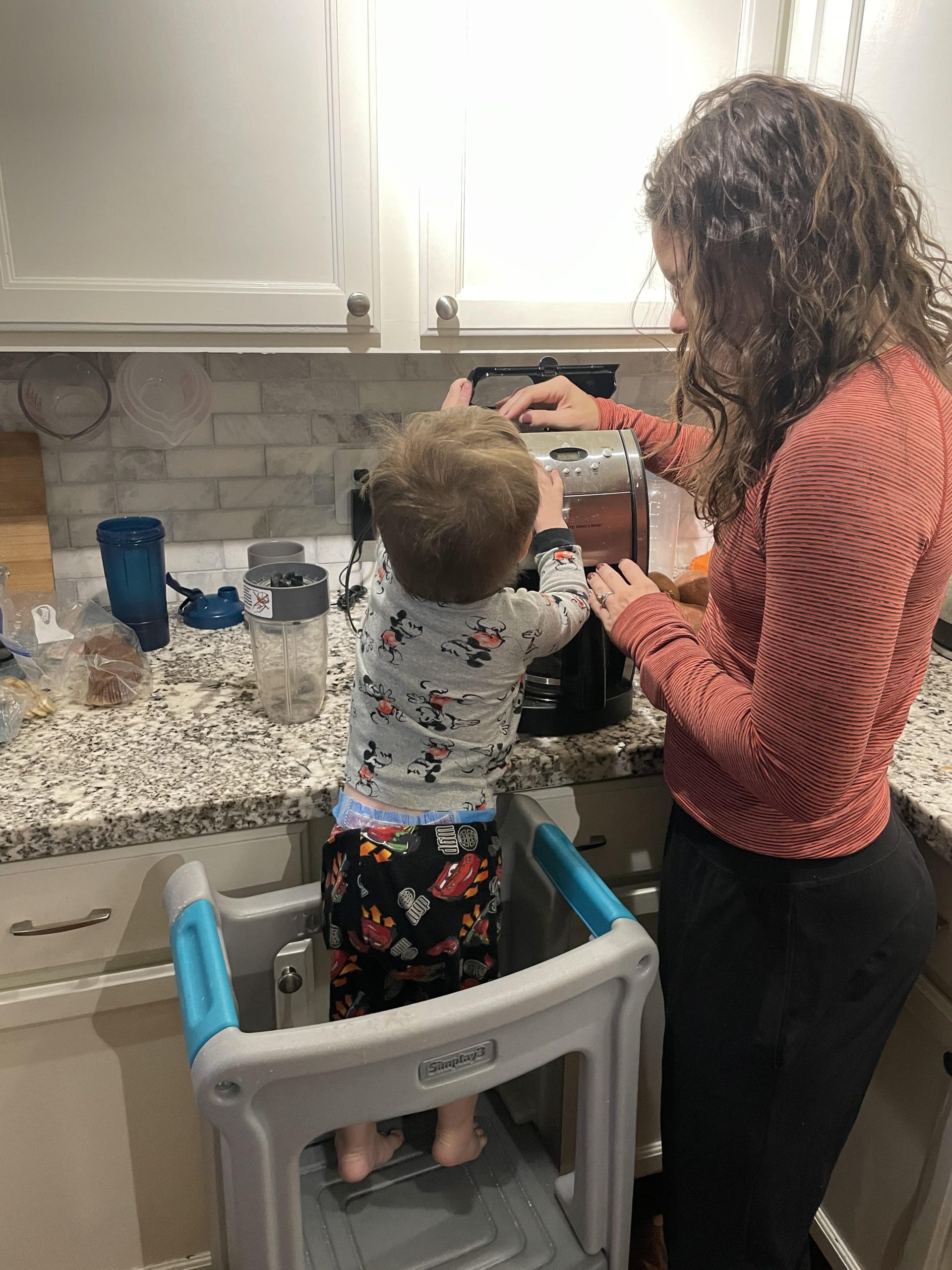 Leo helping Mom make coffee